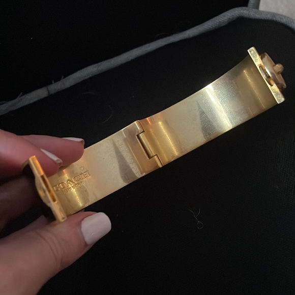 Beautiful Coach Wide Black and Gold Bangle with Turnlock Design. - Picture 4 of 6